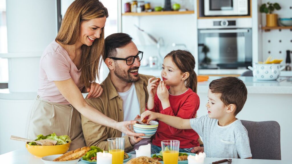 Family sharing a meal together at the table