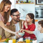 Family sharing a meal together at the table
