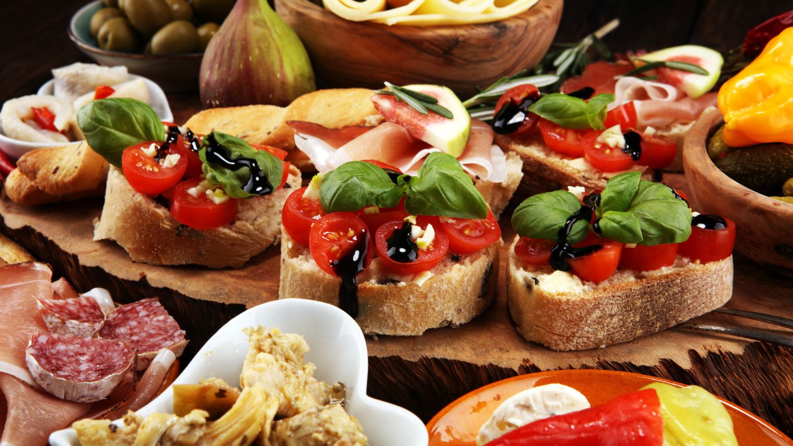 Table filled with a bunch of appetizers