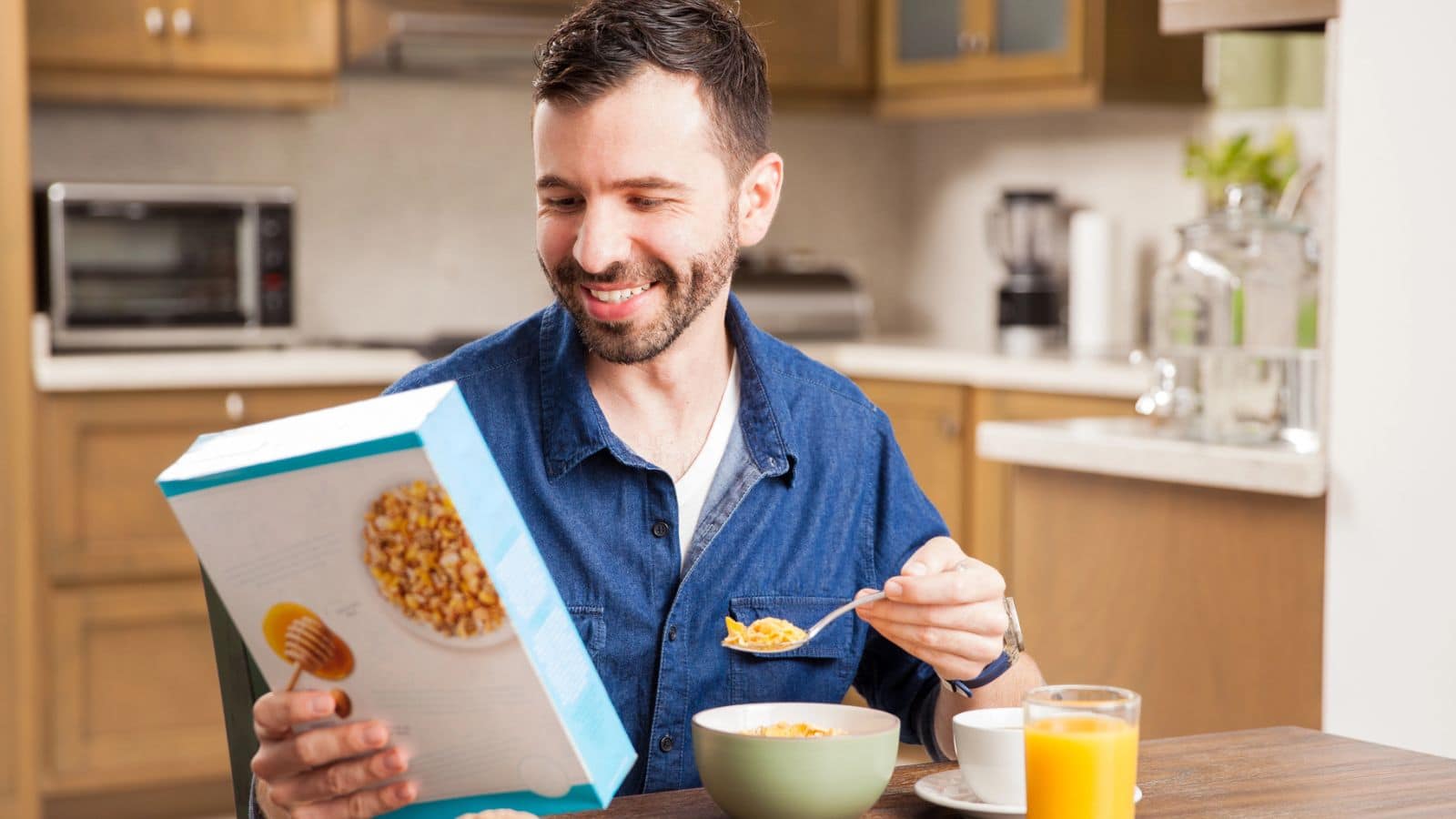 Man eating generic cereal for breakfast