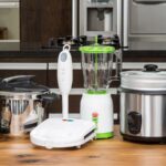 A bunch of small appliances sitting on a kitchen island