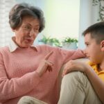 Grandmother talking to her grandson