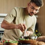 Man cooking in home kitchen