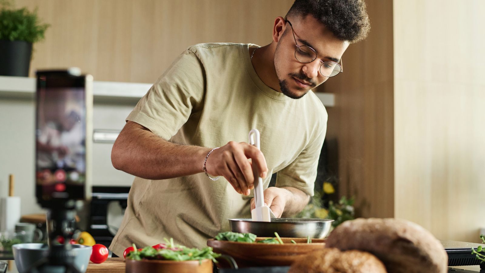 Man cooking in home kitchen