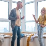 Dad and teenage daughter arguing