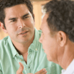 Dad and adult son having a heated discussion