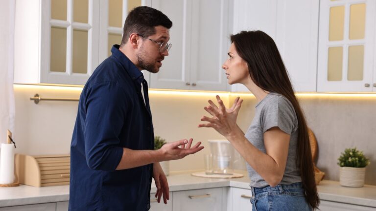 Married couple arguing in the kitchen