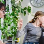 Girl looking upset with her mom