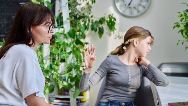 Girl looking upset with her mom