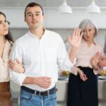 Couple leaving parents house with both couples annoyed