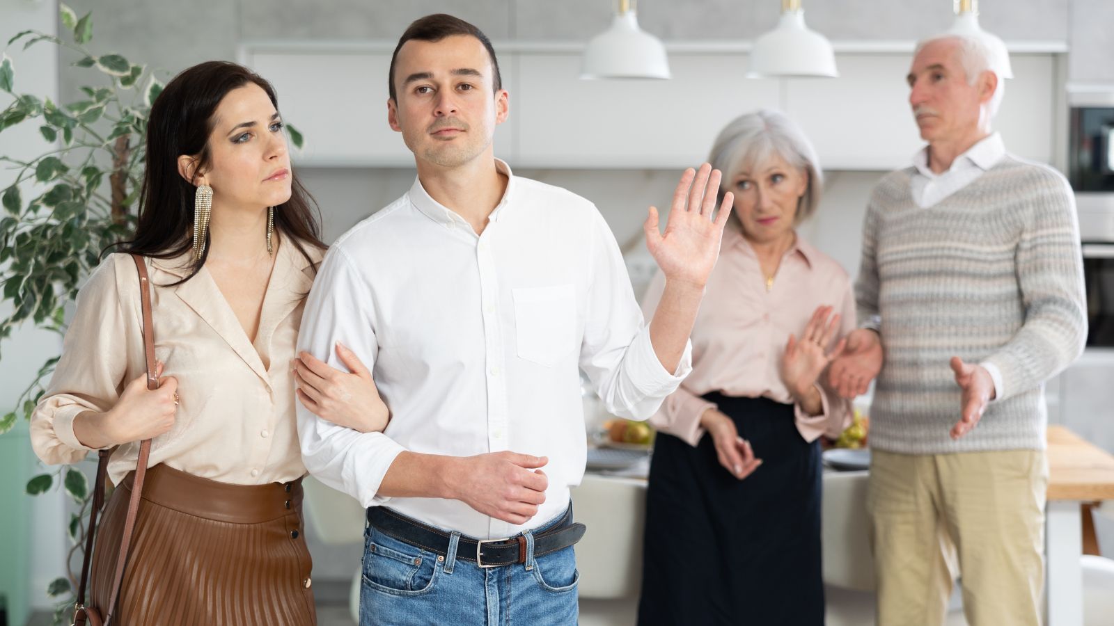 Couple leaving parents house with both couples annoyed