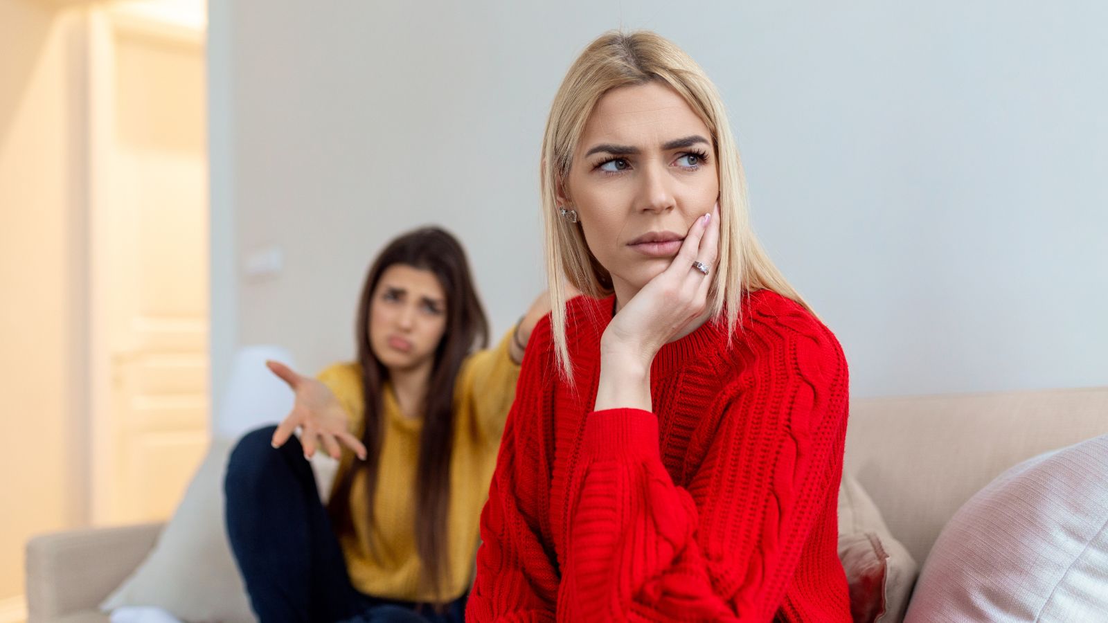 Two women looking like they're not getting along
