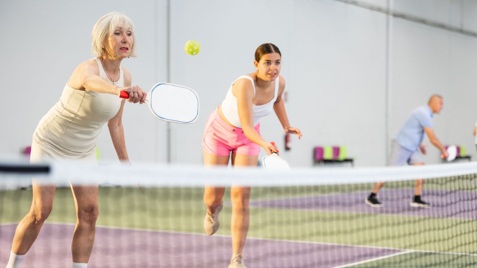 Women playing pickleball