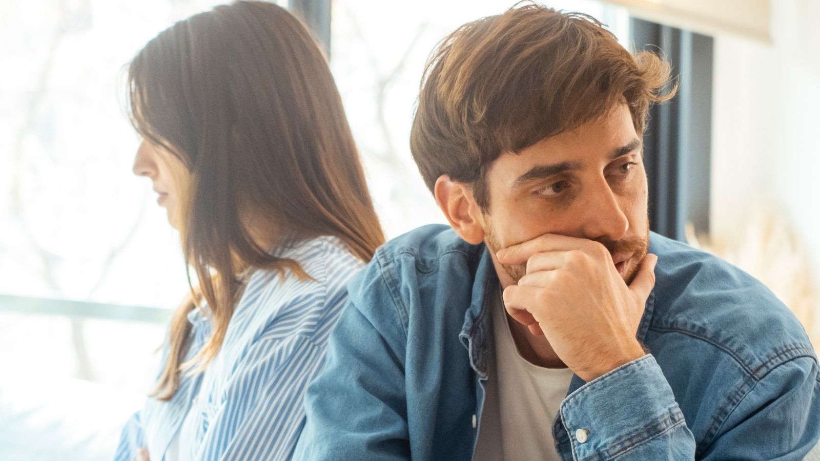Couple giving each other the silent treatment