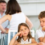 Parents arguing with kids in the room