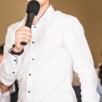 Man giving a speech at a wedding