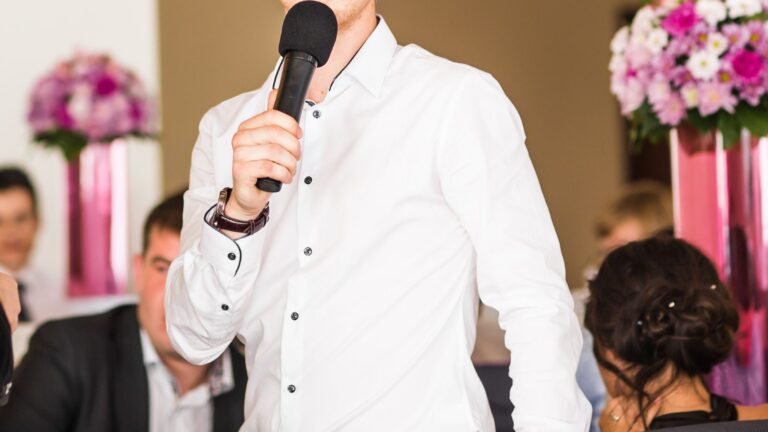 Man giving a speech at a wedding