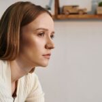 Woman looking upset staring