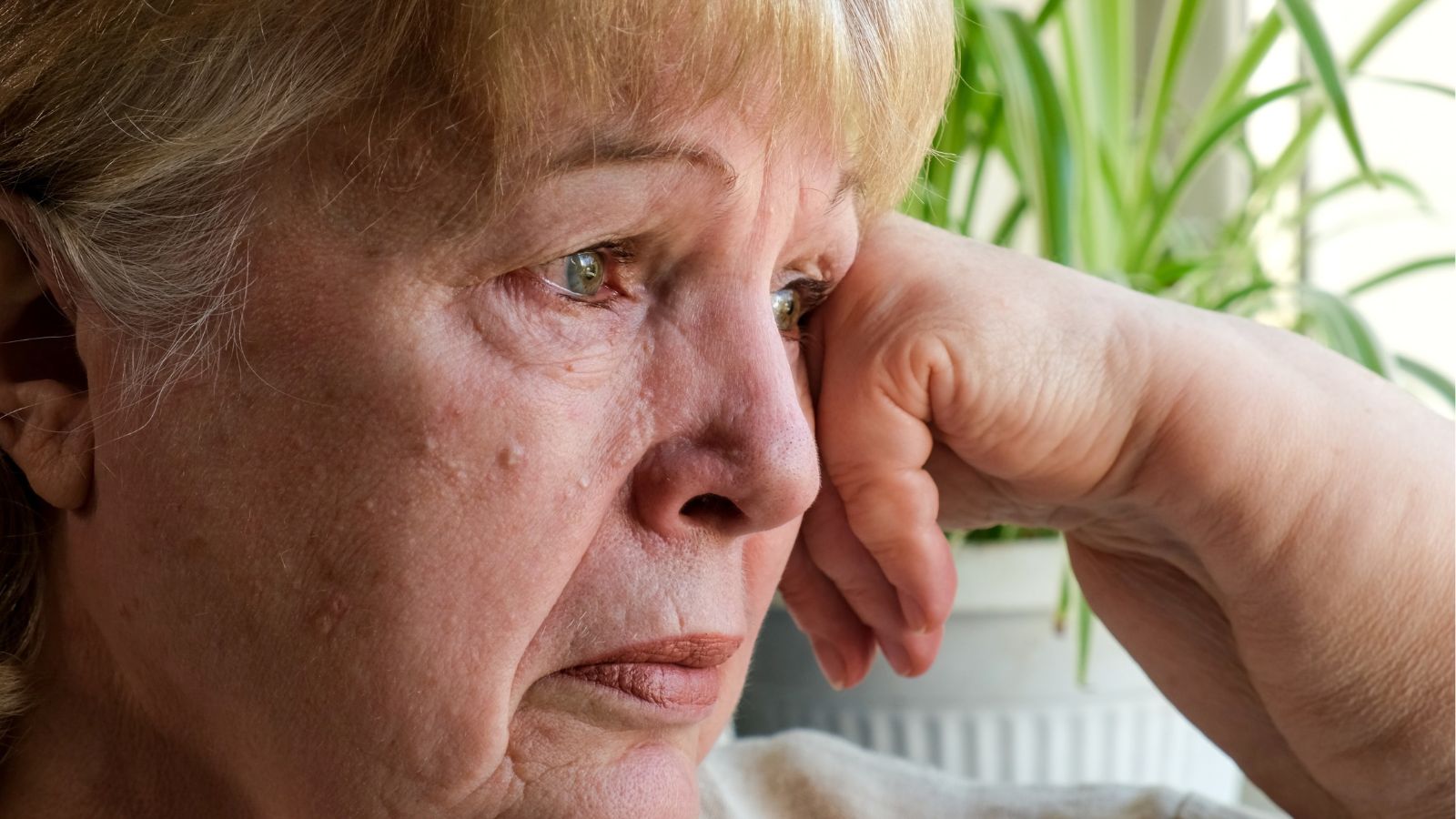 Older woman looking very upset
