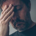 Middle-aged man looking very stressed
