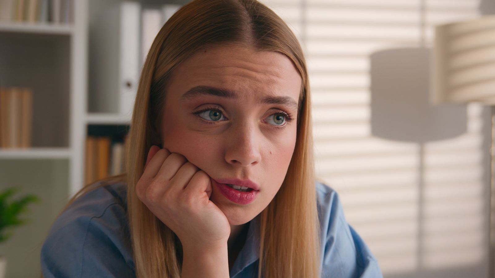 Blonde looking like she's confused or tired