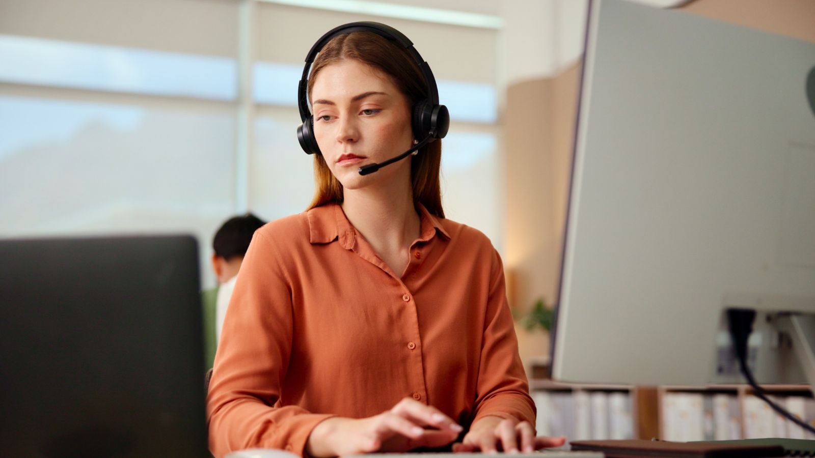 Young woman working in a call center