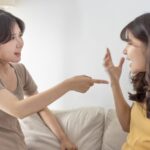 Friend arguing with each other on the couch