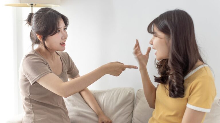 Friend arguing with each other on the couch