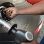 Man putting gas in his car