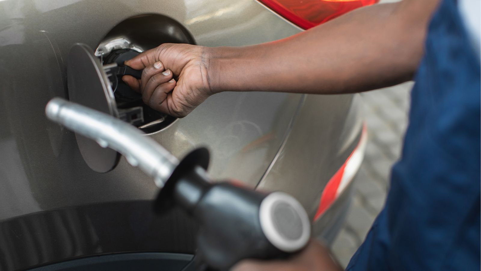 Man putting gas in his car