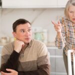 Mother chastising adult son