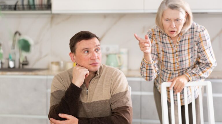 Mother chastising adult son