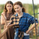 Women standing outside talking