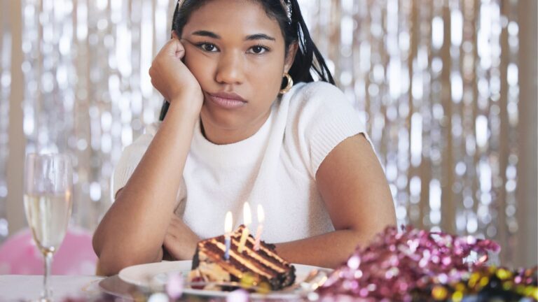 Birthday girl looking upset at her party