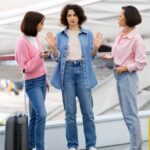 Three female friends arguing while traveling