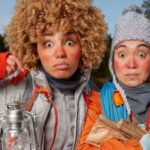 Women looking cold and scared while camping