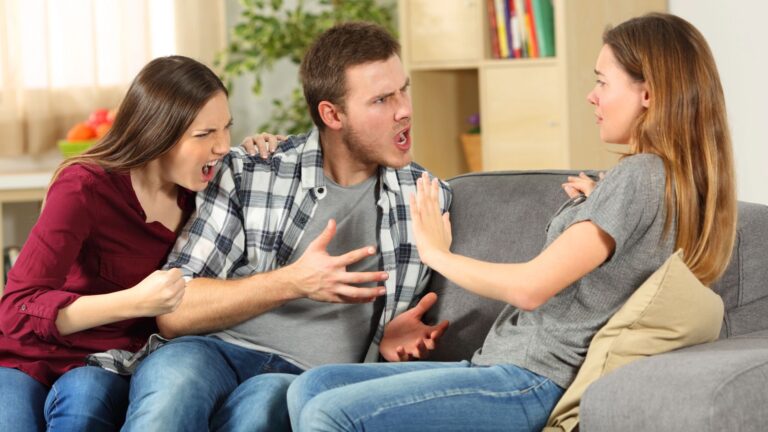 Roommates fighting on the couch